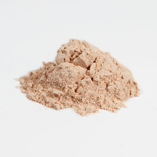 Beige powder on a white background
