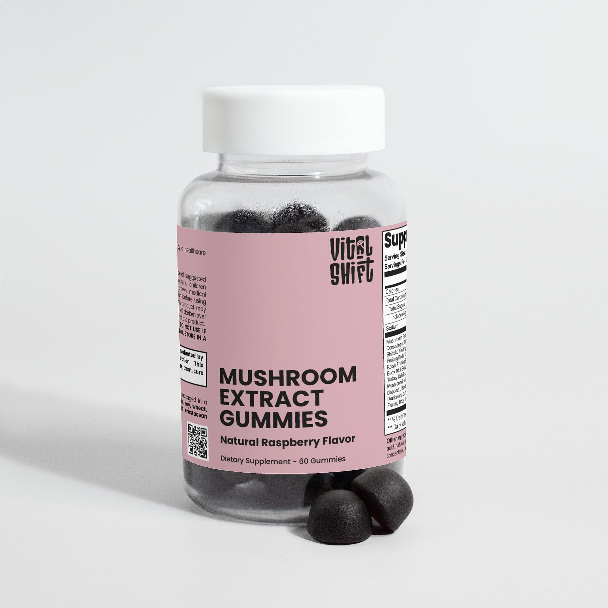 Bottle of Mushroom Extract Gummies with a pink label on a light gray background