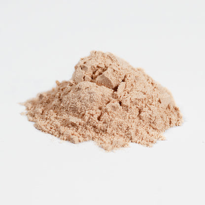 Beige powder on a white background